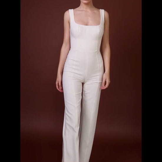 White tailored jumpsuit by BOLDNSUBTLE – precision fit with structured detailing, designed for effortless, elevated dressing.