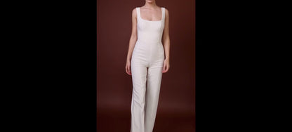 White tailored jumpsuit by BOLDNSUBTLE – precision fit with structured detailing, designed for effortless, elevated dressing.